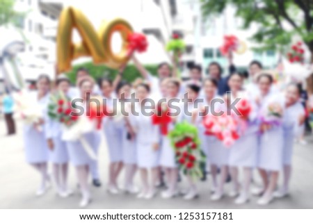 Blurred of Nursing students at the graduation ceremony in Congratulations event, Nursing students standing in take group photo, Medical Student Nurse Thai Blur image for background