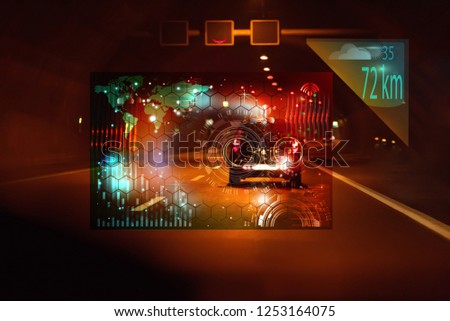 car driving through tunnel; highway tunnel at night.car HUD dashboard. Futuristic user interface HUD and Infographic elements. Abstract virtual graphic touch user interface.