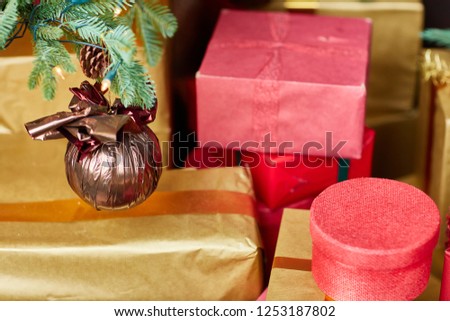 Christmas gifts of red colour. New Year background