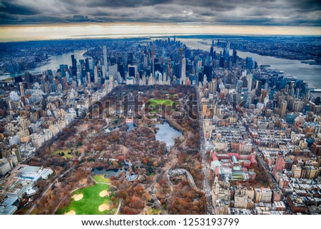 Aerial view of Manhattan. Central Park, city skyscrapers with Hudson and East River in winter season.