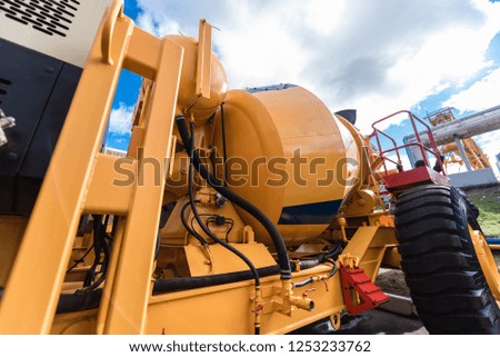 Element of the yellow concrete mixer