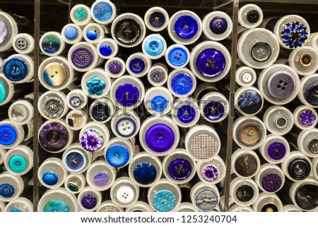 Variety of sewing buttons for sale at textile shop