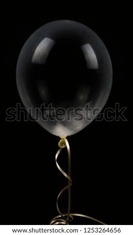 Balloon with black background and gold ribbon festive decoration clear balloon birthday celebration party