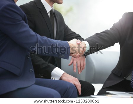 close up.handshake business people at a meeting