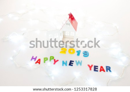 New Year 2019 is coming concept. Happy New Year 2019. Symbol from number 2019 and Home mock up on white background. Home Concept : Buy, Sale, Rent, Investment, Mortgage, Loan, Financial, Renovate