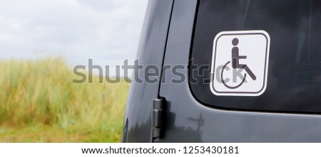 on the windshield of the car the sign is invalid Royalty-Free Stock Photo #1253430181