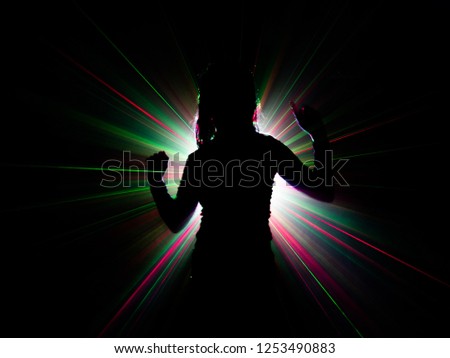 silhouette of woman dancing on abstract background