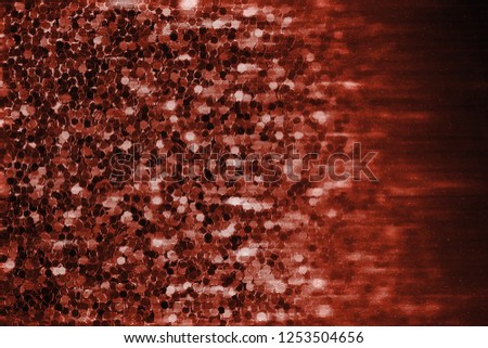 Abstract background with bokeh, defocused christmas lights. Festive concept. Living Coral - Color of the Year 2019.