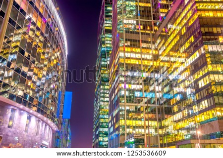 Panorama of the night skyscrapers of the Moscow business center, a lot of luminous offices with bright lights