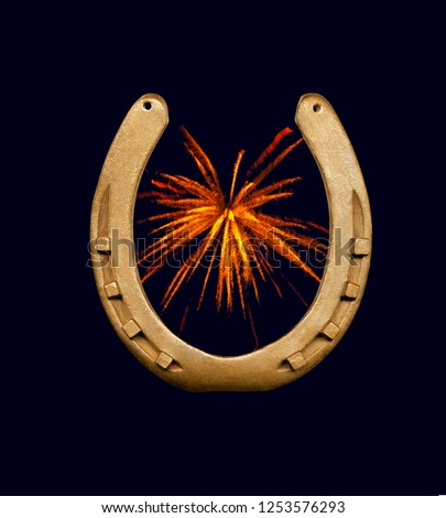 Symbolic picture, horseshoe with fireworks