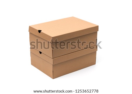 Brown cardboard shoes box with lid for shoe or sneaker product packaging mockup, isolated on white background with clipping path. Royalty-Free Stock Photo #1253652778