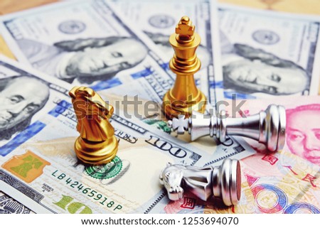 Money game. Chess game. Referring two big countries's conflict. China and US trade war. International finance concept. The competition between two kings of money currencies, Yuan and Us dollars. Royalty-Free Stock Photo #1253694070