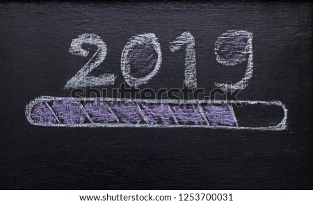 2019 loading with progress bar, chalk drawing on blackboard
