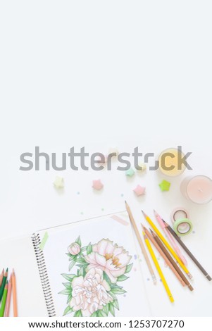 concept of women's hobbies and leisure. drawing with simple colored pencils