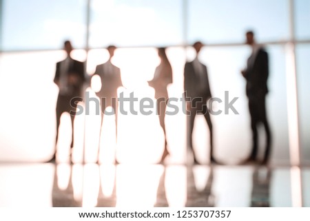 Silhouettes of Business People in Office. Mixed media .