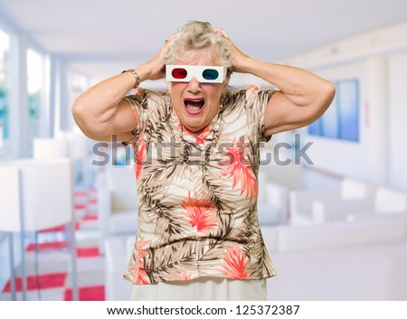 Shocked Senior Woman Watching 3d Movie, Indoors