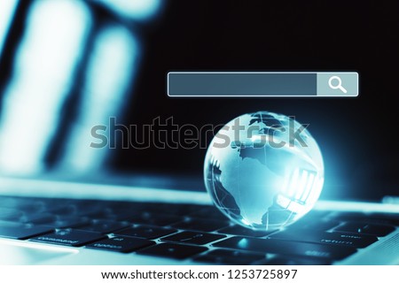 Laptop  computer and world  with internet network structure. Searching information data on internet networking concept