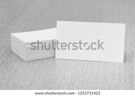 Business card on the wooden table.