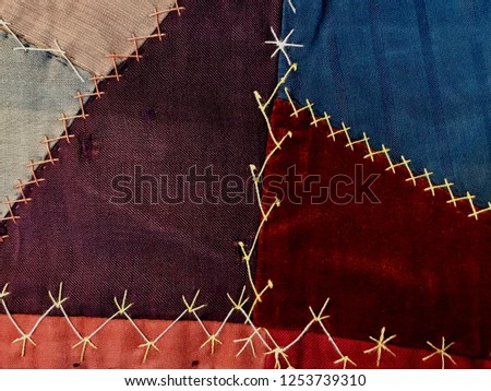 Crazy Quilt Fabric Pattern and Stitching Textile Royalty-Free Stock Photo #1253739310