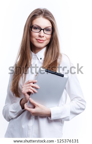 Young woman with digital tablet computer PC isolated on white background wearing white business shirt and glasses