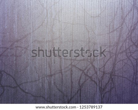 Surface of misted glass, purple texture, background