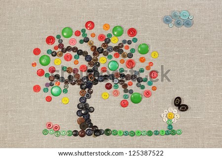 A painting of a fruit tree, flower and butterfly, composed of the buttons