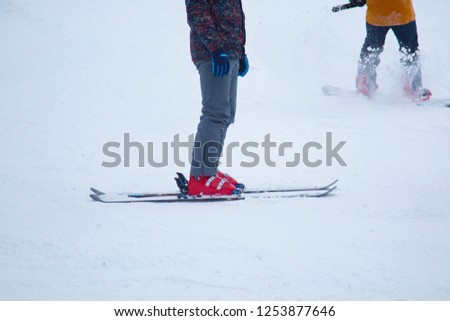 a snowboarder rides a snowboard