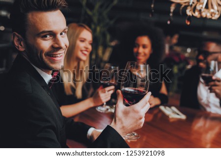 Businessmans Having Meeting In Indoor Restaurant. Group Business People Geting Order in Restaurant. Corporate, Collaboration Concept. Team Professional Worker. Teamwork. Holding Menu. Cheers Glasses.