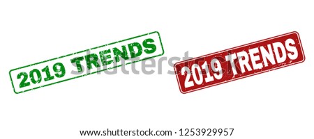 Grunge 2019 Trends stamp seals. Vector 2019 Trends rubber seal imitation in red and green colors. Text is placed inside rounded rectangle frames with grunge effect.