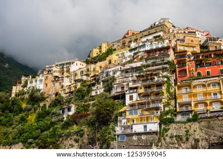 View of Positano village on a cloudy day along Amalfi Coast in Italy.
