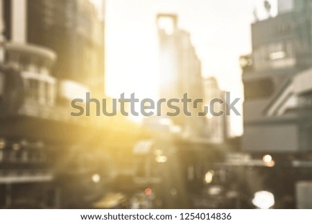 Blur capital town many buildings in city with high technology transportation system  with sunlight background.