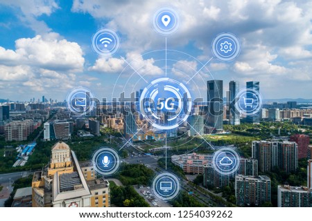 5G network wireless systems and internet of things with modern city skyline