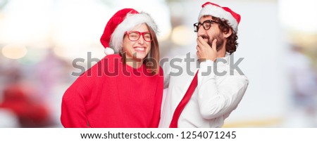 young couple expressing christmas concept.