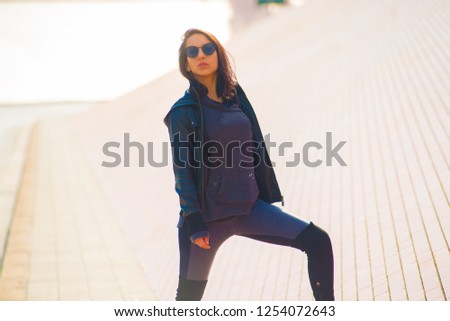 Caucasian female model poses for pictures at the tourists destination Barcelona, Spain. Barcelona is known as an Artistic city located in the east coast of Spain.

