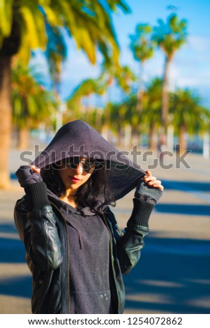 Caucasian female model poses for pictures at the tourists destination Barcelona, Spain. Barcelona is known as an Artistic city located in the east coast of Spain.

