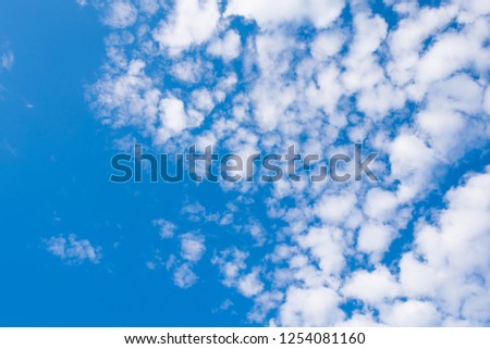 Beautiful blue sky background with white clouds.