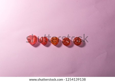 Pink Candy on pink pastel wall for background.