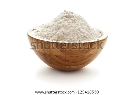 wheat flour in wooden bowl Royalty-Free Stock Photo #125418530