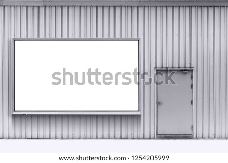 Blank billboard for advertising on the industry warehouse wall.