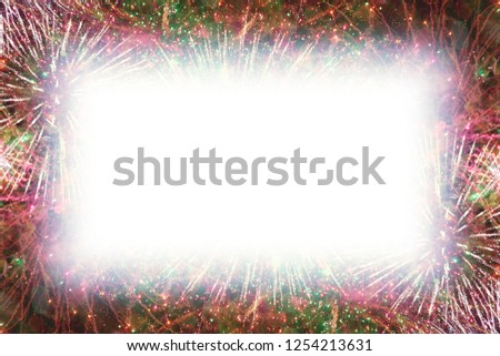 Colorful fireworks with white rectangle glowing edges copy space in the middle