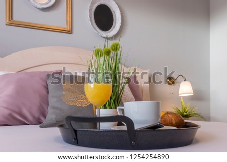 bedroom breakfast, croissant, fresh juice and coffee