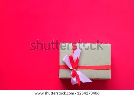 Christmas gifts box isolated on red background,cover space for text.