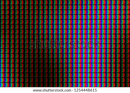Closeup of pixels on an a plasma TV screen.