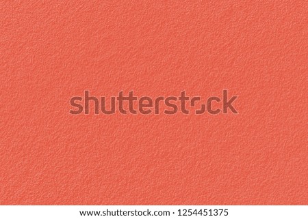 Trend photography Color of the Year 2019 Living Coral. Copy space empty textured rough concrete wall or sands background.