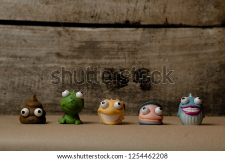series of cute rubber figures with big eyes in various angles