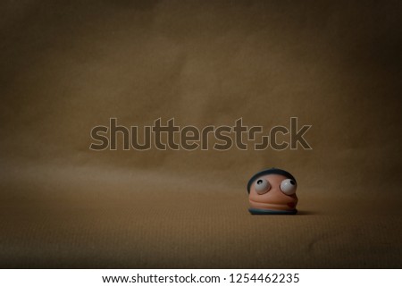 series of cute rubber figures with big eyes in various angles