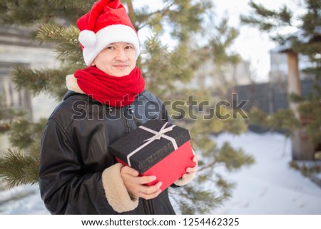 Young guy with a gift in hand