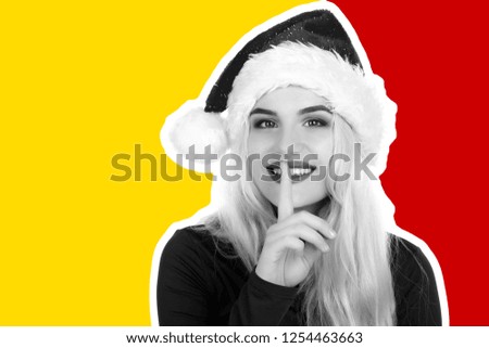 Attractive smiling young girl dressed in Santa's hat making faces and dreams about gifts. Christmas and New Year advertising concept Magazine style fashion collage with blank copy space