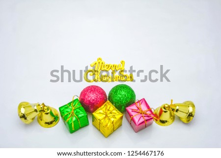 christmas gift box and baubles isolated on white background