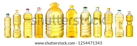 oil bottle isolated on white background Royalty-Free Stock Photo #1254471343
